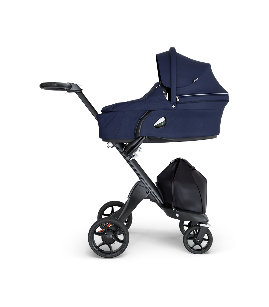 Stokke&reg; Xplory&reg; wtih Black Chassis and Leatherette Black handle. Stokke&reg; Stroller Carry Cot Deep Blue.